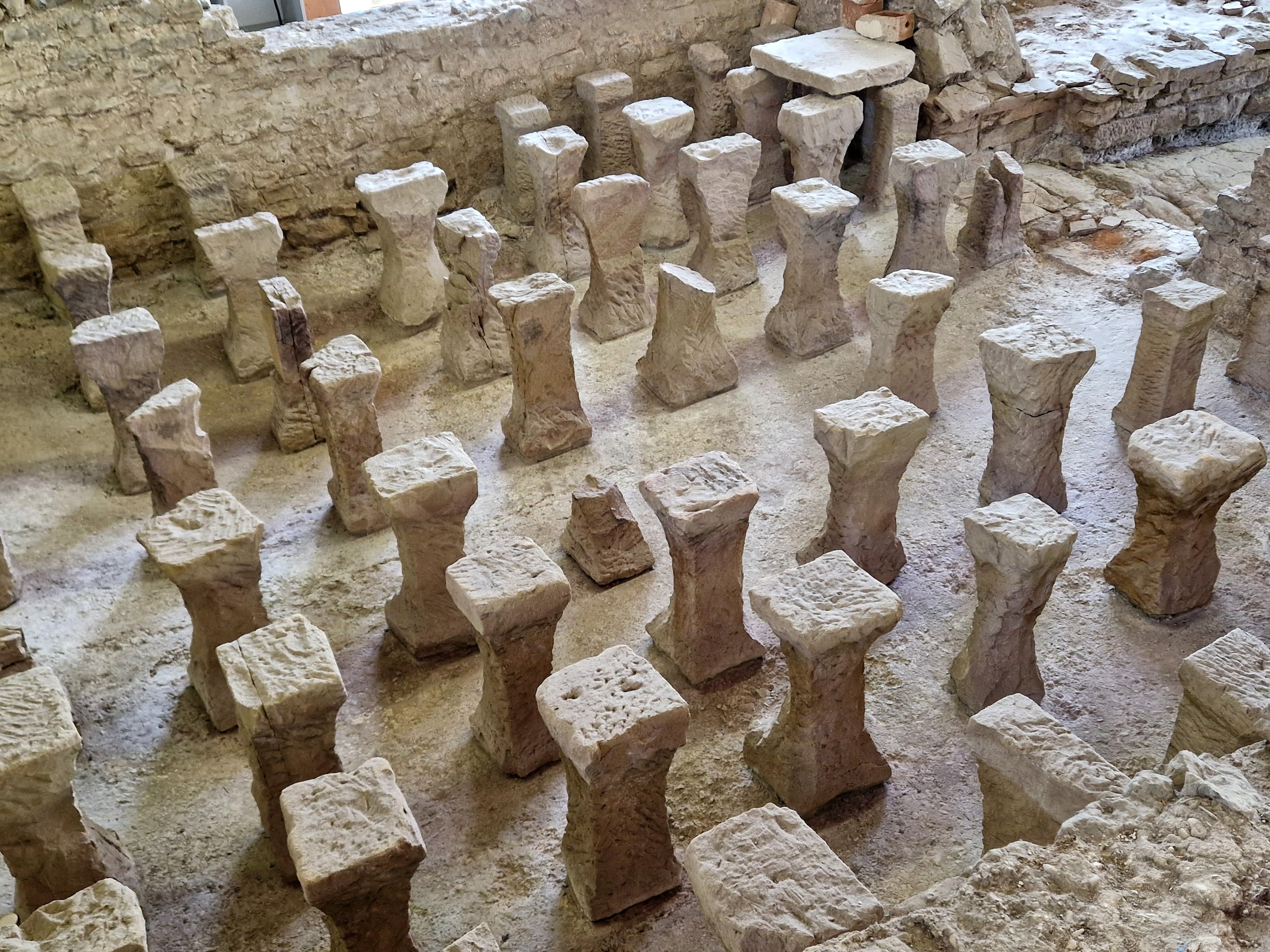 Ancient stone pillars forming a Roman hypocaust system.