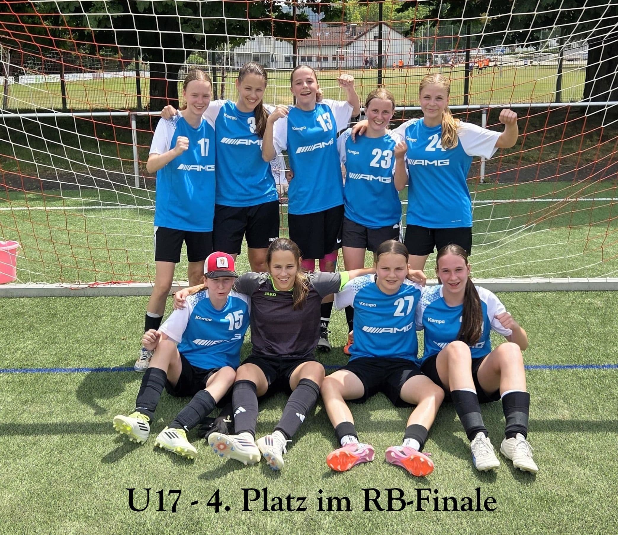 U17 girls' soccer team in blue and white jerseys poses on a field after placing 4th in the RB-Final.